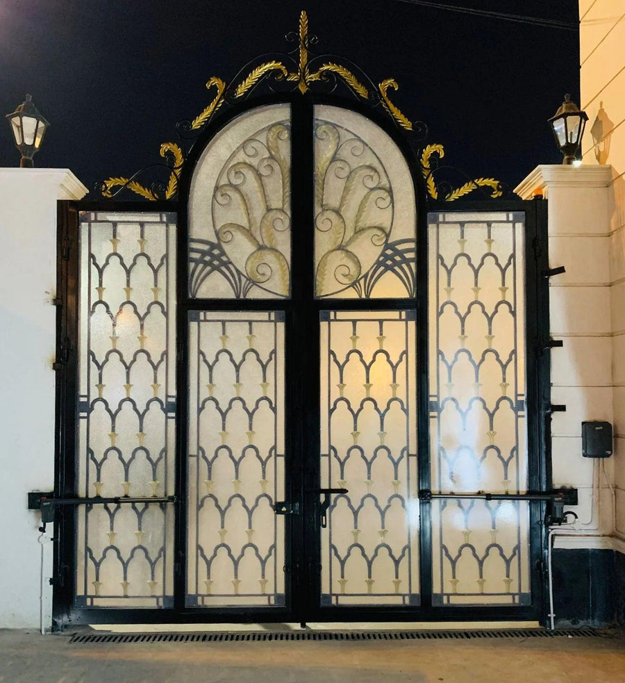Luxury ornate swing gate with gold accents and frosted glass, ideal for upscale homes in Qatar