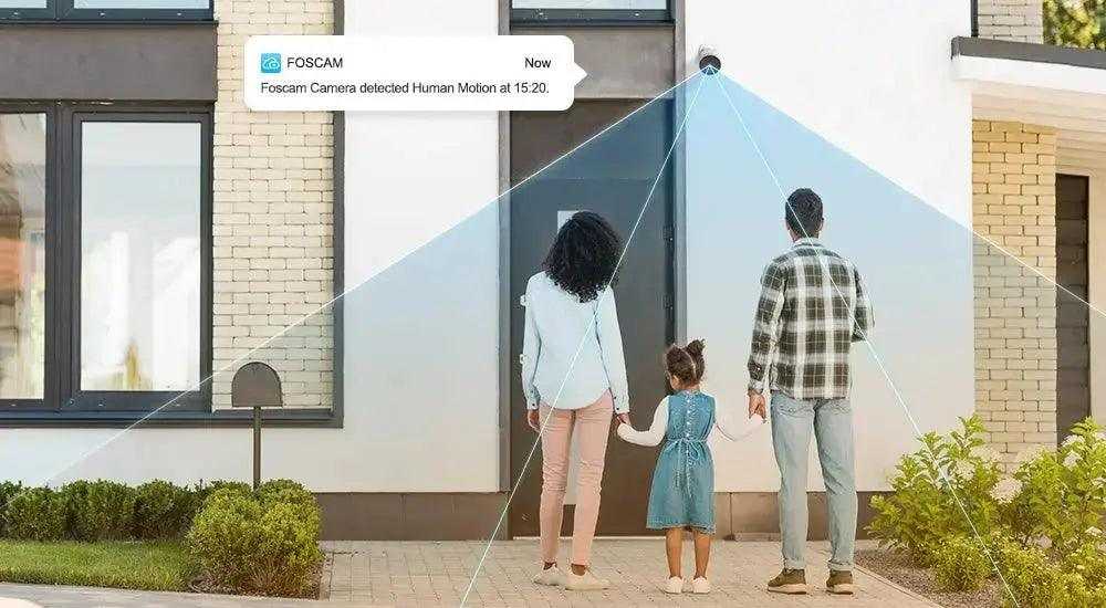 Foscam S21 Wi-Fi Bullet Camera, white bullet camera shown monitoring a family at an entrance with a blue detection zone overlay.