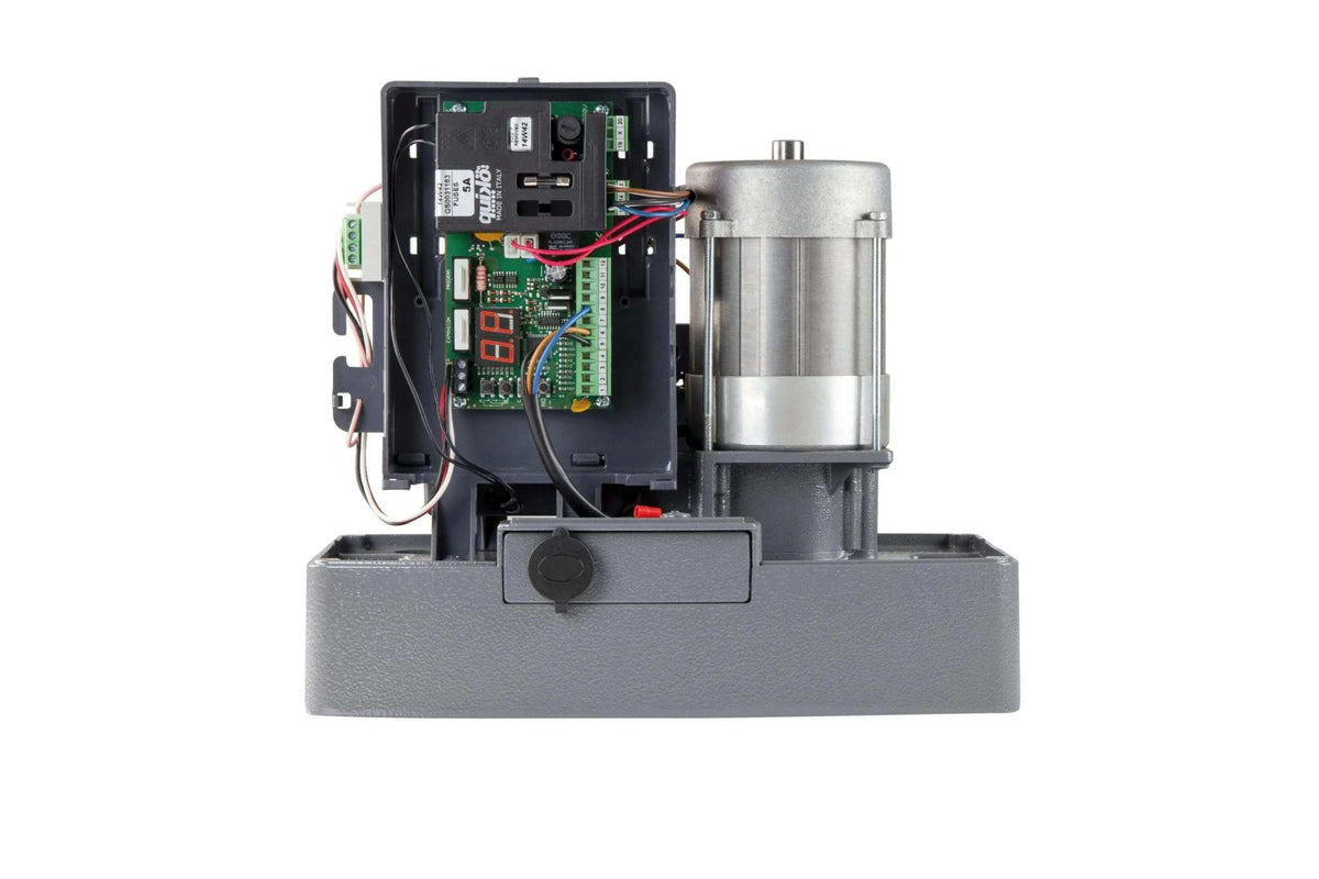 Quiko MOOVY Sliding Gate Operator with a grey metal base, exposed circuit board, wiring, and silver cylindrical motor.