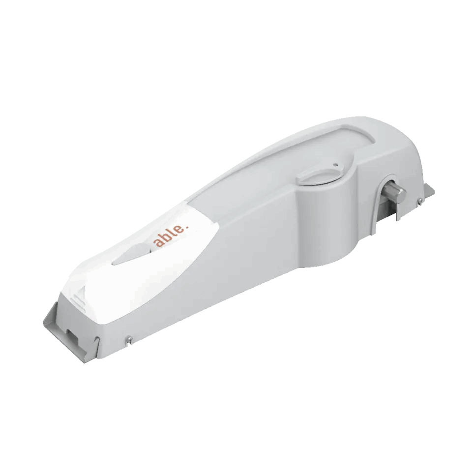 Garage door operator, Able DD Small 9000D 230, with a smooth white casing and compact elongated body.