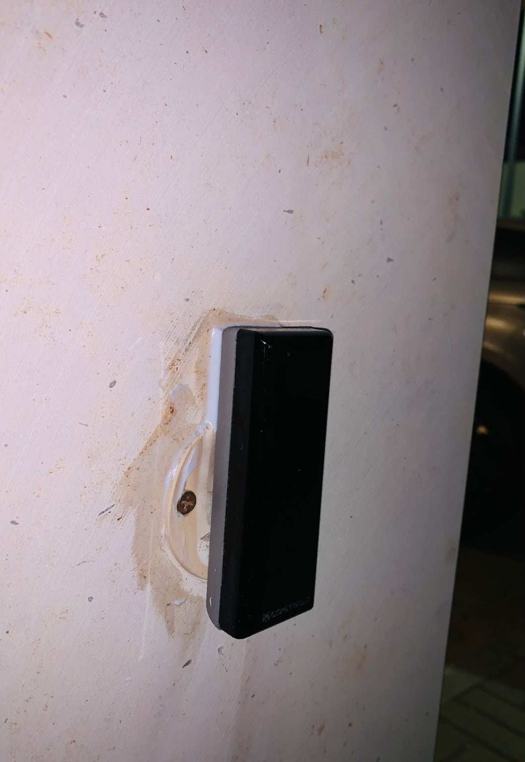 Gate safety photocell, Comunello DART SLIM Gate Safety Photocells, with a slim black rectangular plastic casing and wall mount.
