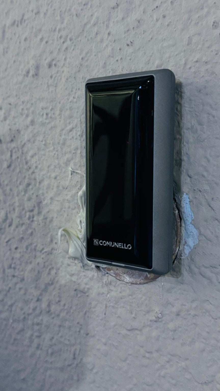 Comunello DART SLIM Gate Safety Photocells with a slim black glossy rectangular housing and Comunello branding