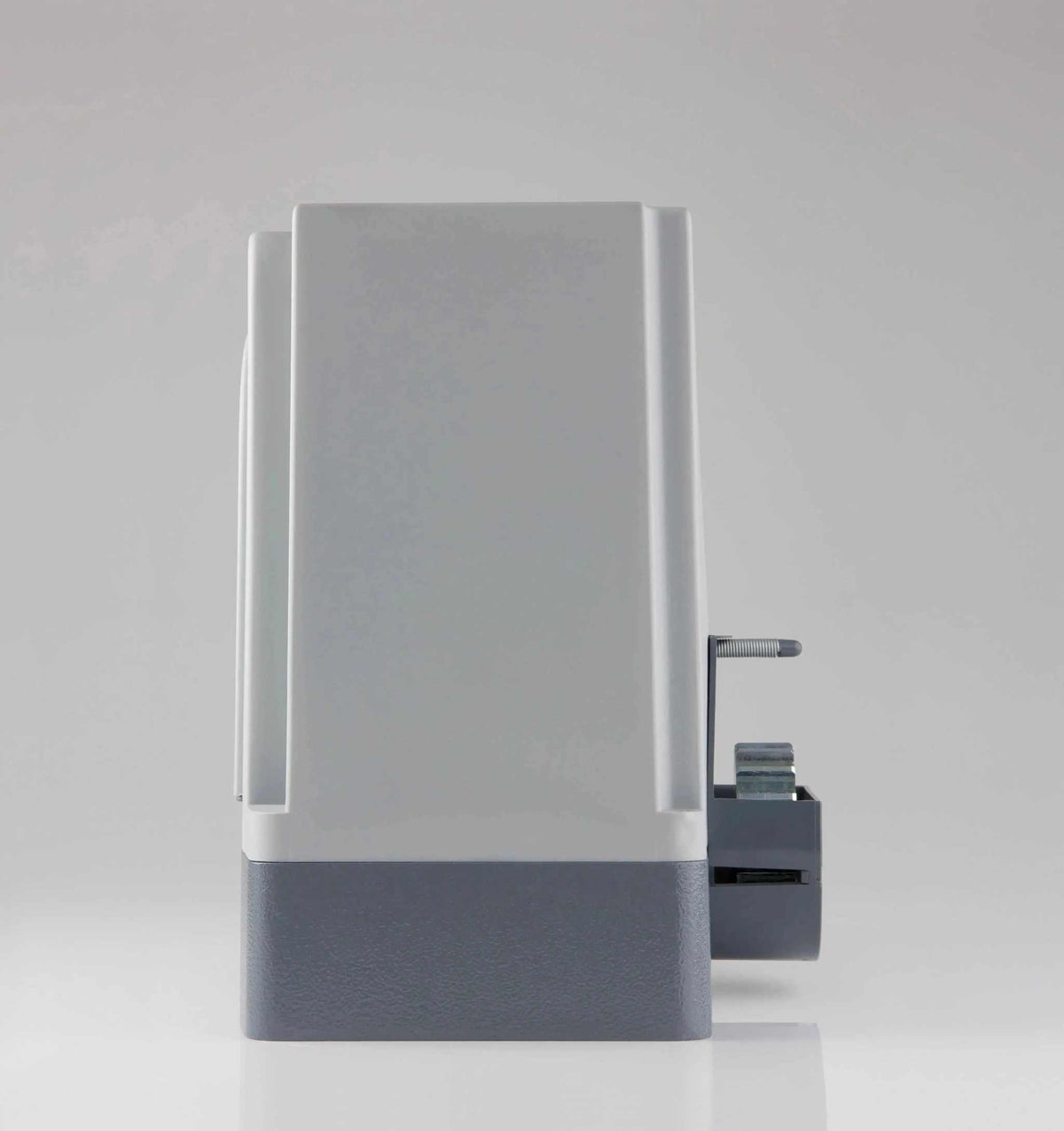Quiko MOOVY sliding gate operator in Qatar, a compact gray and charcoal unit with smooth rectangular casing.