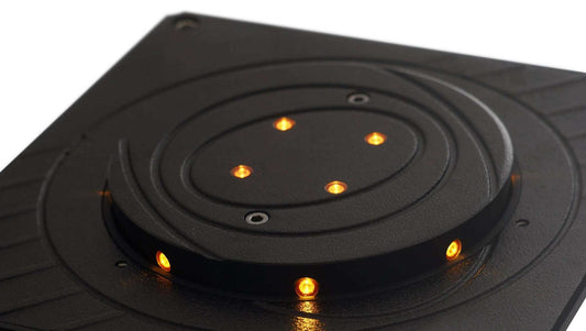 Quiko Automatic Rising Bollards with a black circular metal top, amber warning lights, and visible mounting plate