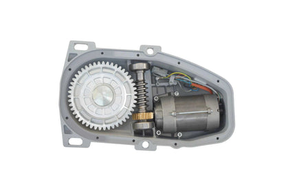Comunello EAGLE Underground Swing Gate Motor with a grey metal housing, exposed white gear, spring and electric motor.