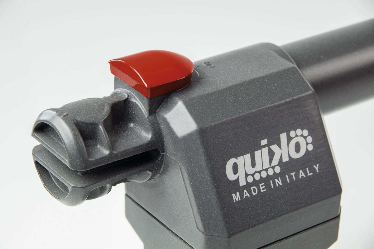 Quiko EON E-600 Swing Gate Operator with a dark gray molded housing, red release lever, and branded Quiko lettering.