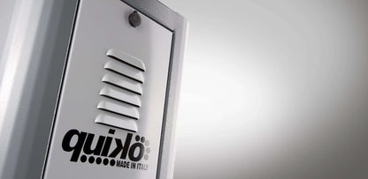 Quiko TITANO Heavy Duty Gate Operator, silver metal control unit with horizontal vents and bold black Quiko logo
