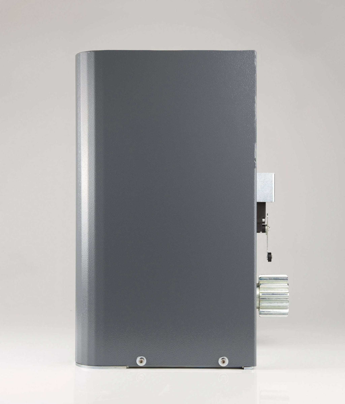 Quiko TITANO Heavy Duty Gate Operator in dark grey metal, with a tall rounded housing and exposed toothed gear rack fitting.