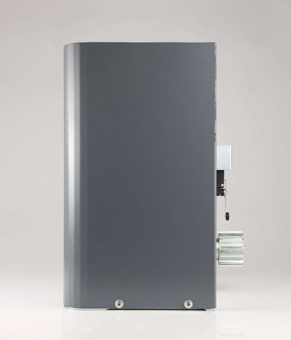 Quiko TITANO Heavy Duty Gate Operator in dark grey metal, with a tall rounded housing and exposed toothed gear rack fitting.