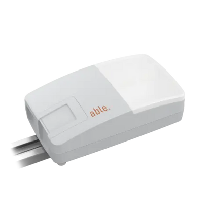 Able DC-Series Garage Door Operators white control unit with a slim rectangular housing, recessed display and orange able logo