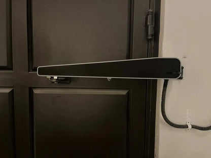 Comunello ABACUS 300 Swing Gate Motor, long black rectangular unit with a slim silver edge and attached cable.
