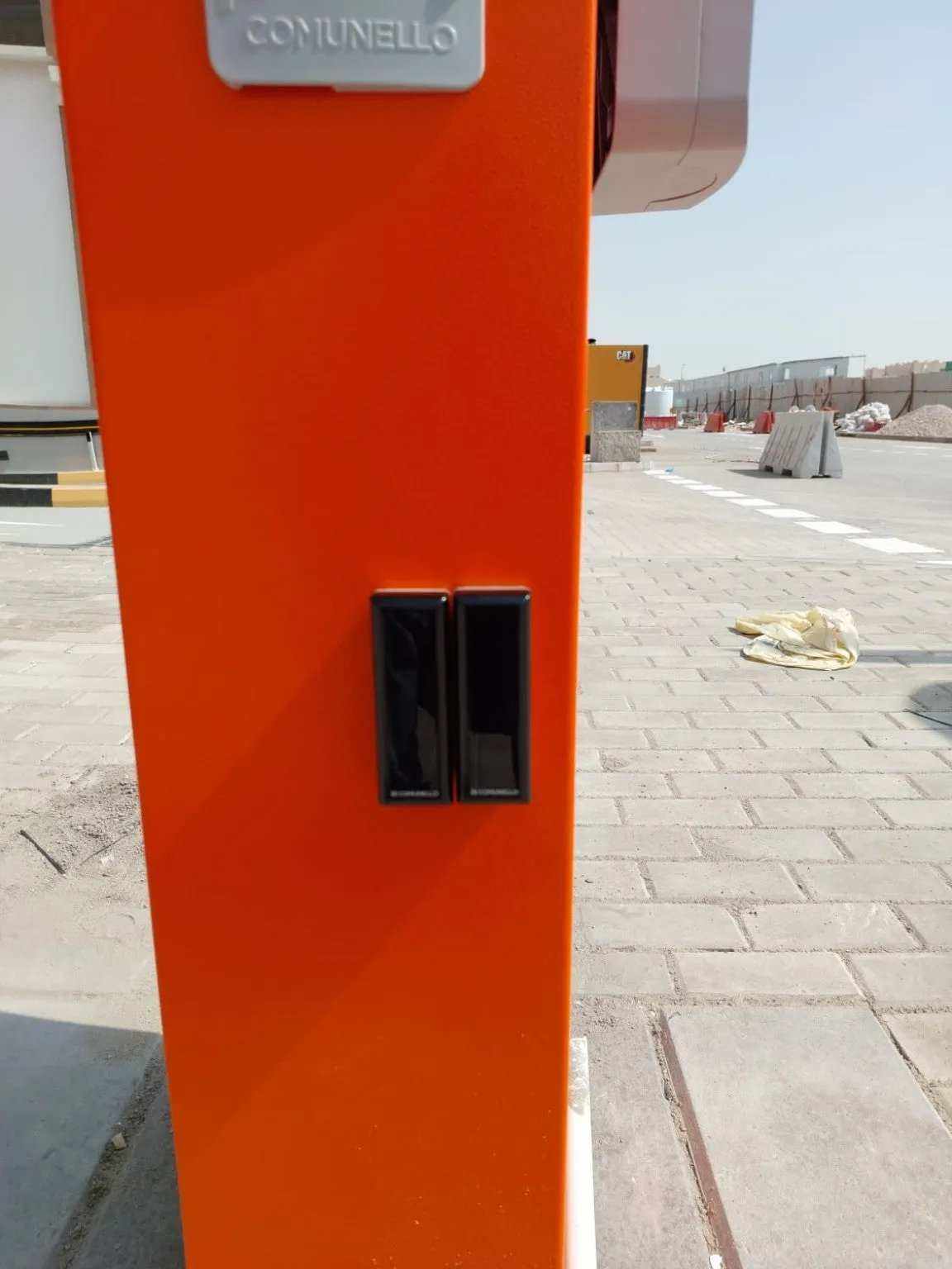 Comunello BORDER 400 Automatic Parking Barrier, orange metal cabinet with two black rectangular front panels