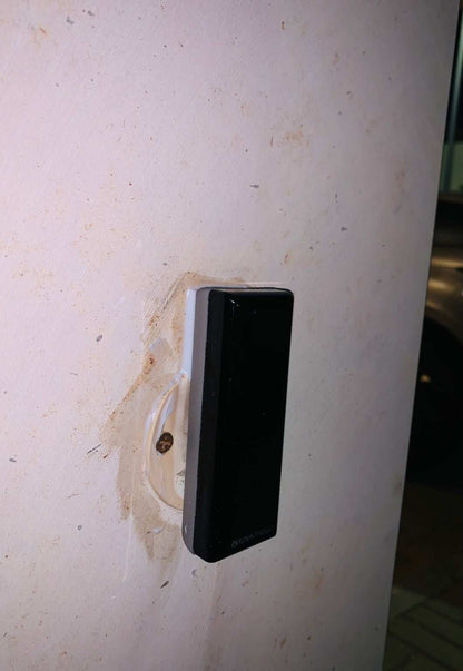 Gate safety photocell, Comunello DART SLIM Gate Safety Photocells, with a slim black rectangular plastic casing and wall mount.