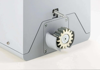 Comunello FORT 1500 Sliding Gate Motor with a silver-grey metal housing, exposed toothed gear and mounting plate