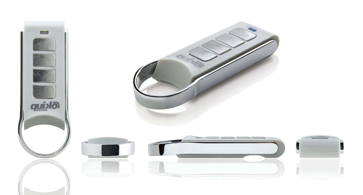 Quiko 4-Channel Gate Remote in silver and grey plastic with four rectangular buttons and a chrome loop