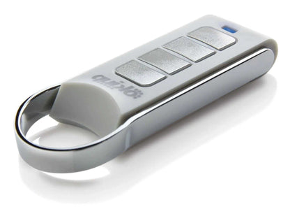 Quiko 4-Channel Gate Remote in silver and white with four rectangular buttons, a blue indicator and keyring loop