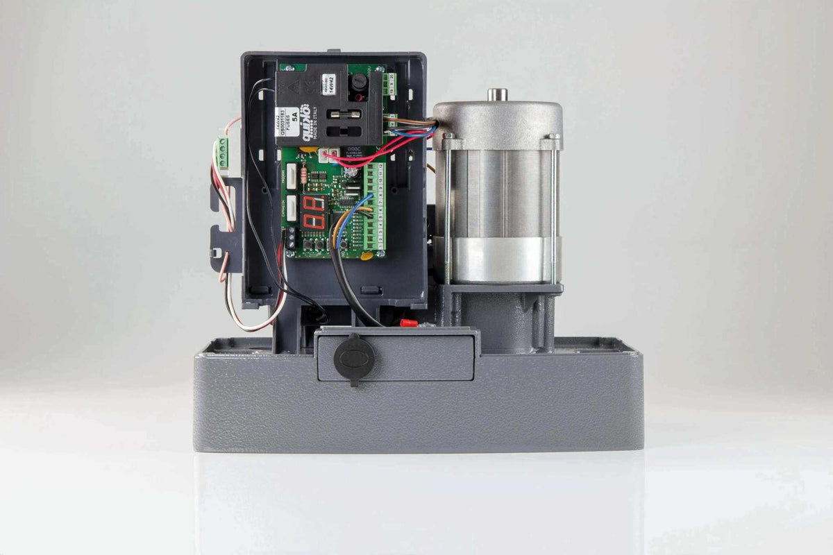 Quiko MOOVY sliding gate operator in Qatar with gray base, exposed circuit board, wiring and silver motor housing