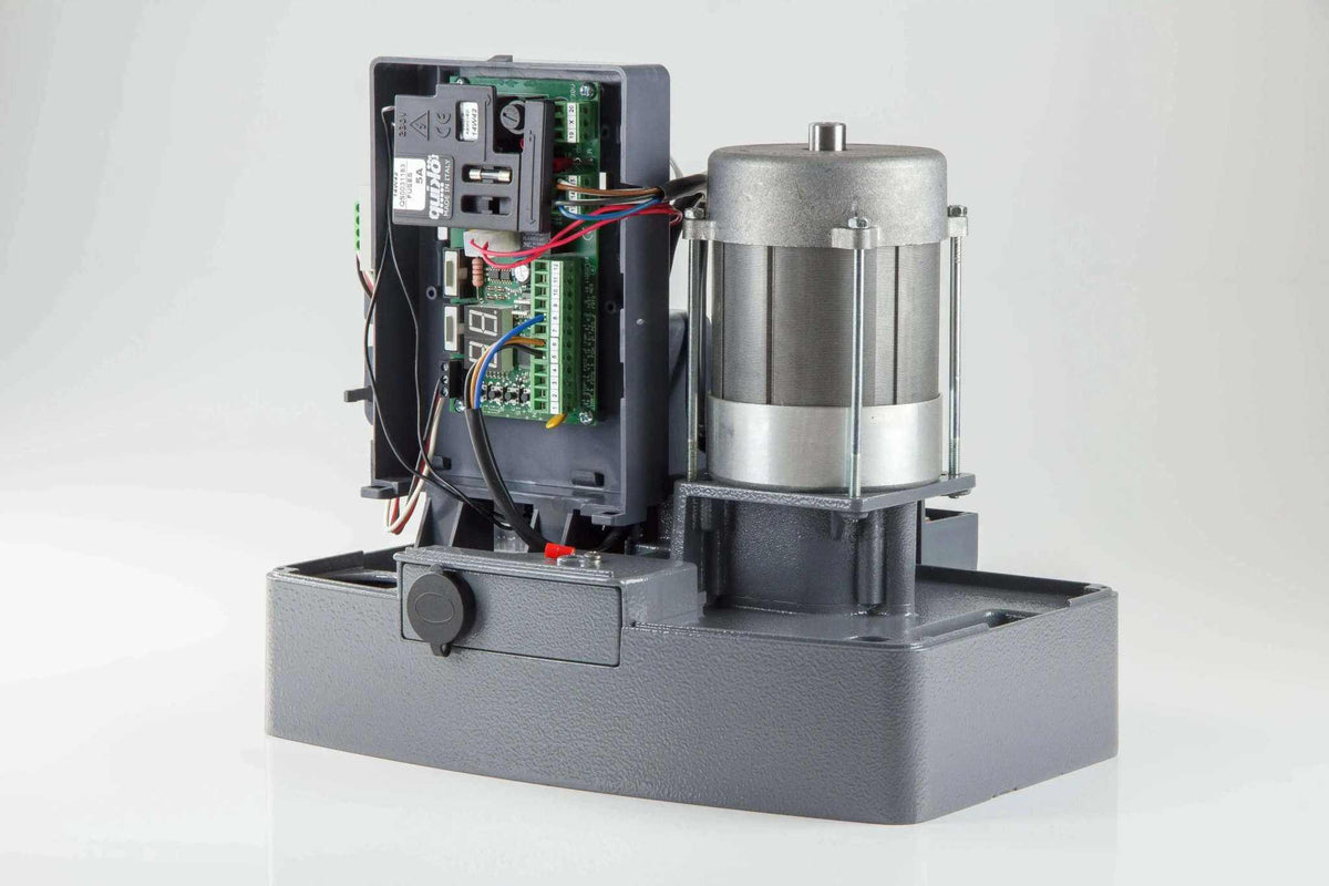 Quiko MOOVY sliding gate operator in Qatar, gray metal housing with exposed circuit board, wiring and cylindrical motor