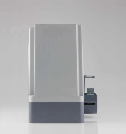 Quiko MOOVY sliding gate operator in Qatar, a compact gray and charcoal unit with smooth rectangular casing.