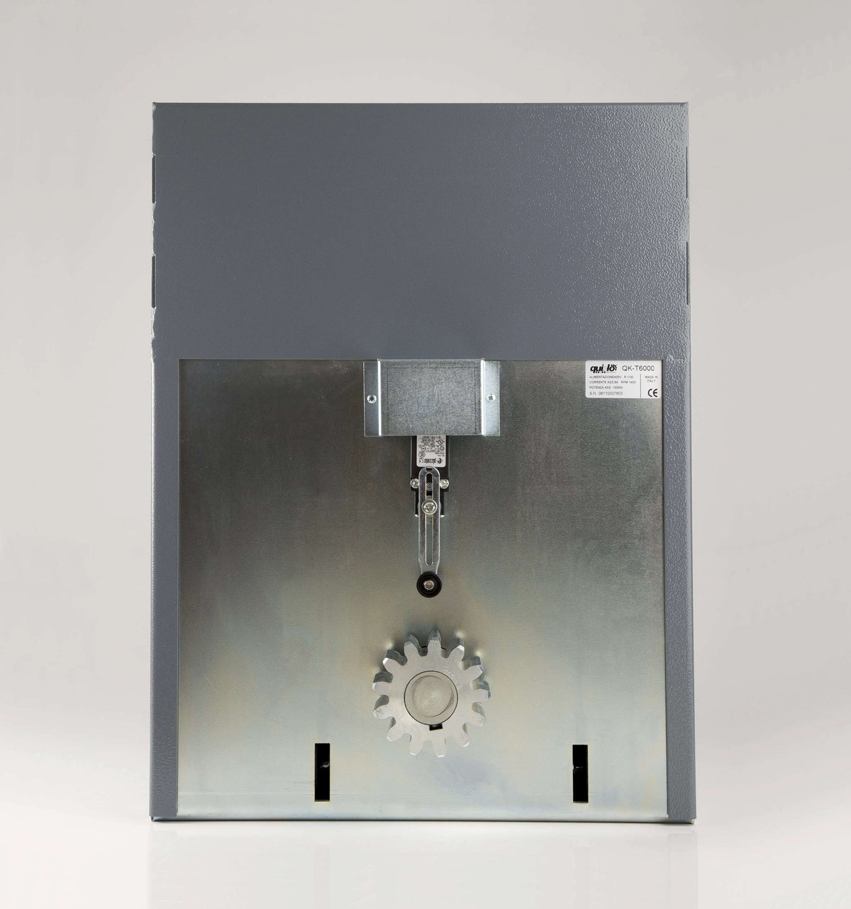 Quiko TITANO Heavy Duty Gate Operator in a gray metal housing with a silver panel and exposed gear mechanism.